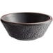 An Acopa black stoneware bowl with a brown rim.