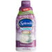 A plastic bottle of Splenda Sugar-Free Sweet Cream Coffee Creamer with a label.