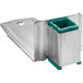 A metal corner with a green square of plastic inside.