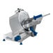 An Edlund silver and blue manual meat slicer.