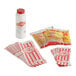 A stack of red and white Carnival King popcorn bags.