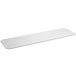 A white rectangular polyethylene cutting board insert.