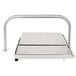 A Vollrath Redco stainless steel tray with a metal handle.