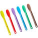 a close-up of several colorful spoons