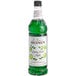 A green bottle of Monin Granny Smith Apple Syrup with a white label.