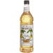 A Monin Premium Vanilla Flavoring Syrup bottle.