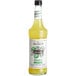 A Monin 750 mL bottle of Margarita Cocktail Mix with a label.