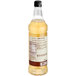 A Monin Zero Calorie Natural Vanilla Flavoring Syrup bottle with a label.