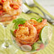 A shrimp and avocado salad seasoned with McCormick Peruvian seasoning in a glass.