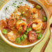 A bowl of Zatarain's gumbo with rice and shrimp.