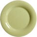 A close up of a green GET Diamond Harvest Avocado wide rim plate.