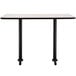 A black rectangular National Public Seating bar height table with legs.