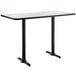 A rectangular white table with black edges and legs.