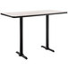 A black rectangular National Public Seating cafe table with black legs.