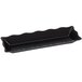 A black rectangular melamine display tray with scalloped edges.