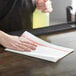 a blurry image of a hand holding a metal object