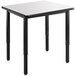 a square table with black legs