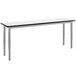 a white rectangular table with black trim