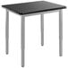 A black table with a metal frame and legs.