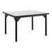 A black rectangular National Public Seating utility table with a white high-pressure laminate top.