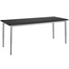 A black rectangular table with silver legs.