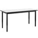 a black rectangular table with a white surface