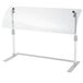 A white rectangular table with a clear acrylic panel on a metal base.