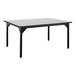 A black rectangular National Public Seating utility table with black legs and a gray top.