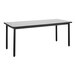 A National Public Seating black rectangular utility table with black legs.