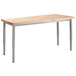A National Public Seating utility table with a wooden top and metal legs.
