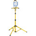 A yellow Voltec work light stand with black handles and a single blue square light.
