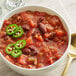 A bowl of chili with Dei Fratelli Seasoned Diced Tomatoes.