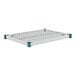 A Regency green epoxy metal shelf with a white polymer drop mat.