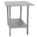 An Advance Tabco stainless steel work table with a galvanized undershelf.