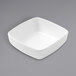 An American Metalcraft white square melamine bowl.