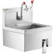 A Regency stainless steel wall mounted hand sink with knee operated eyewash station and faucet.