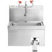 A stainless steel Regency wall mounted hands-free hand sink with knee operated faucets.