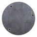 A BFM Seating round tabletop with wireless chargers and holes in it.