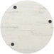 A white circular BFM Seating Relic table top with black circles and 3 wireless chargers.