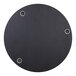 A circular espresso tabletop with holes for wireless chargers.