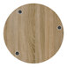 A BFM Seating round wooden table top with wireless chargers.