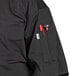 a black jacket with a pocket full of tools