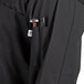 a black jacket with a pocket full of tools