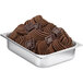 A metal pan filled with Fabbri Stracciatella chocolate flavoring paste.