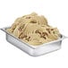 a metal tray with food in it