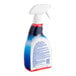 A close up of a white KIK Pure Bright spray bottle with a blue and white nozzle.