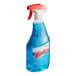 A bottle of Windex glass and multi-surface cleaner with a red spray nozzle.