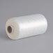 A roll of clear Lavex AirFlow machine net/stretch film on a gray surface.