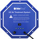 An OdorStop UV air purifier with a blue and white sign showing green lights.