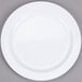 A white Thunder Group Nustone melamine plate with a narrow white rim.